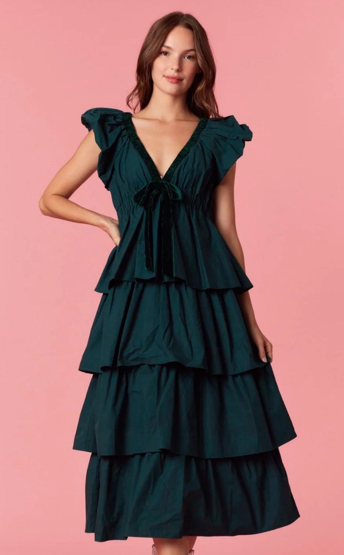 Green Tiered Dress with a Ruffled V-Neck and a Velvet Bow.