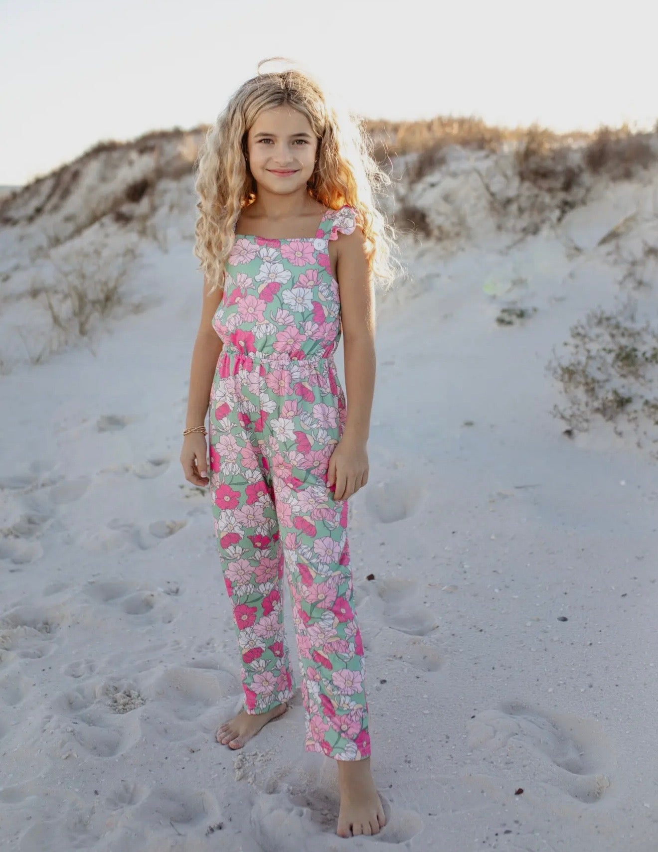 Mint and Pink Floral jumpsuit w/button and ruffle details