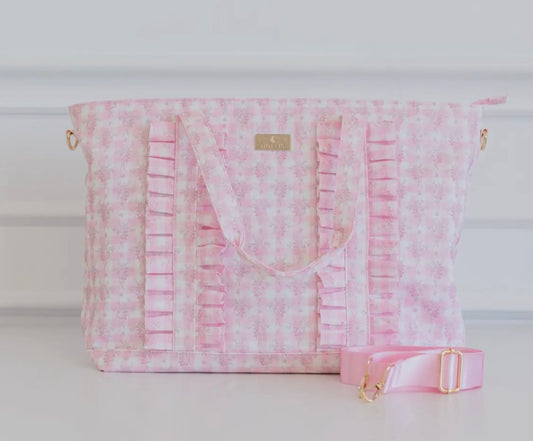 Pink floral ruffle carry on bag