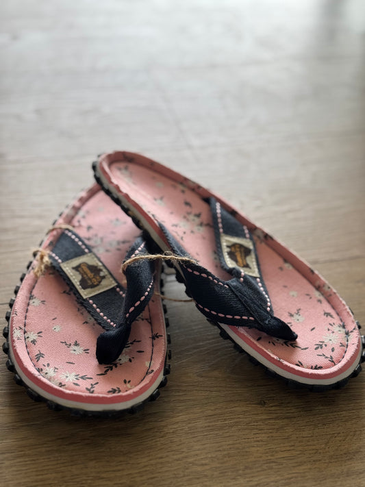 Light pink floral flip flops