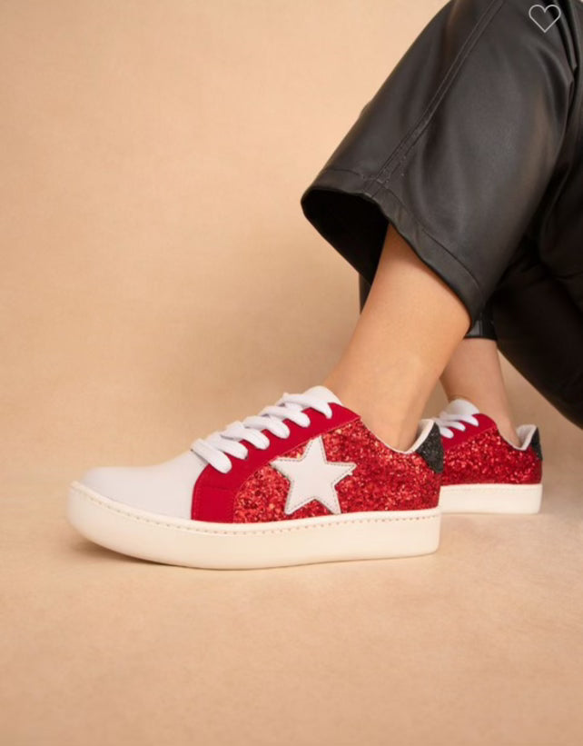 Red sparkle maker’s sneakers