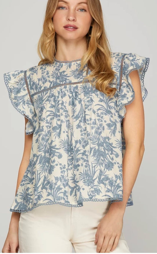 Ruffle sleeve woven print pin tuck top with ladder trim detail